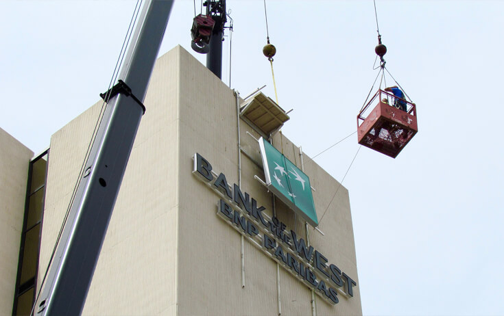 Installing Bank of the West Channel Letters on High rise in Fargo ND