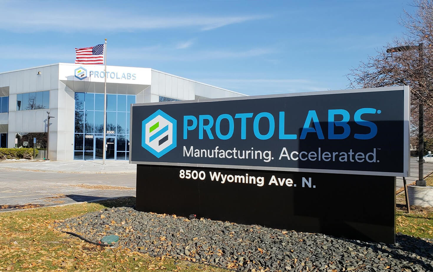 Protolabs Exterior Monument Sign in front of Building with Channel Letters Brooklyn Park MN