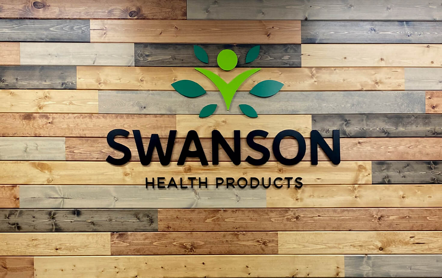 Swanson Health Products Interior Logo on Wood Wall