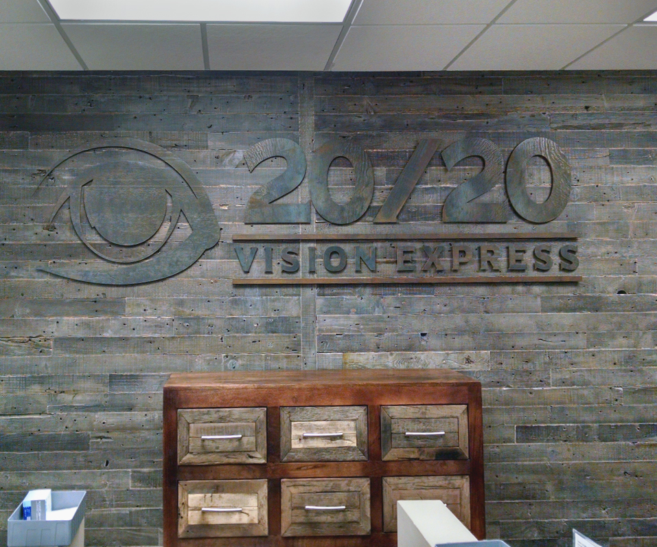 2020 Vision Express Interior Wall Logo with Custom Texture Finish on a reclaimed wood wall