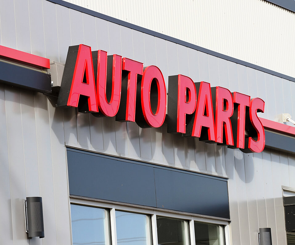 Auto Parts Channel Letters on building with black returns and red faces St Cloud MN