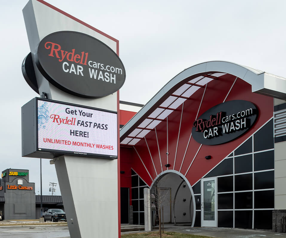 Rydell Car Wash Grand Forks MN pylon sign with custom cabinet and digital display