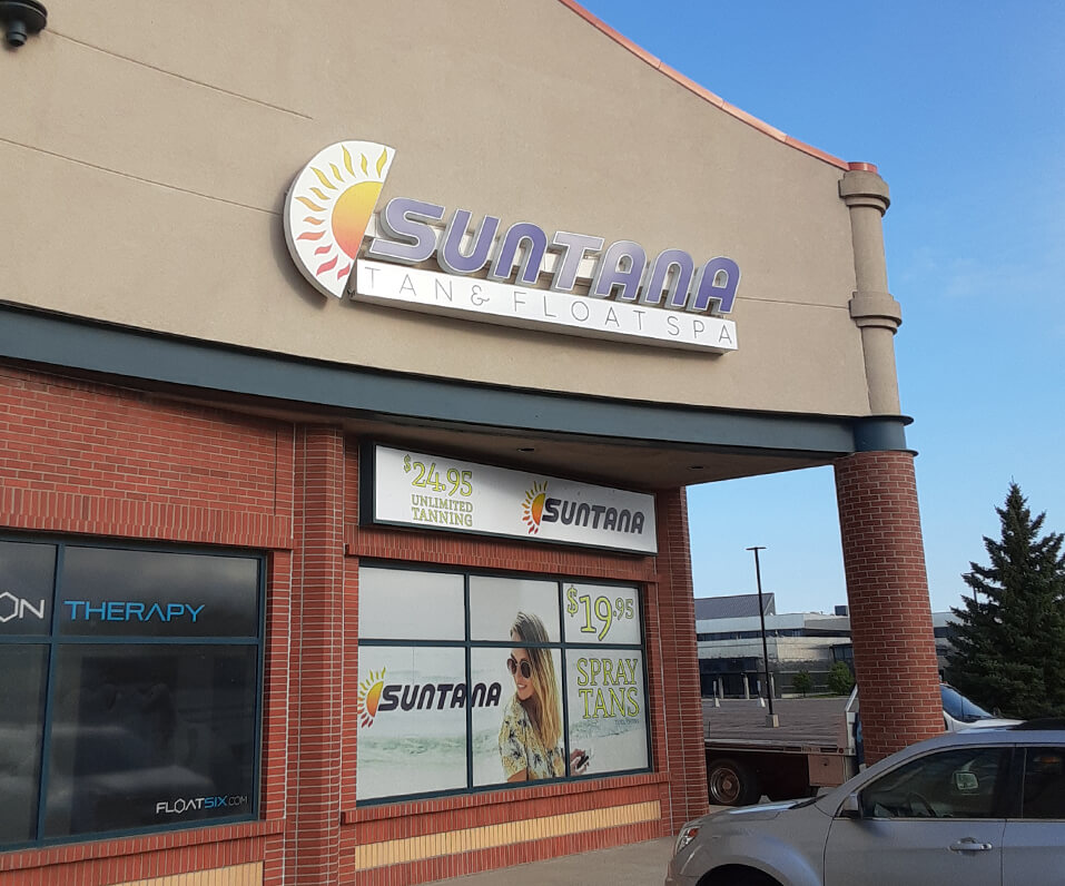 Suntana Storefront Channel Letters with printed window graphics