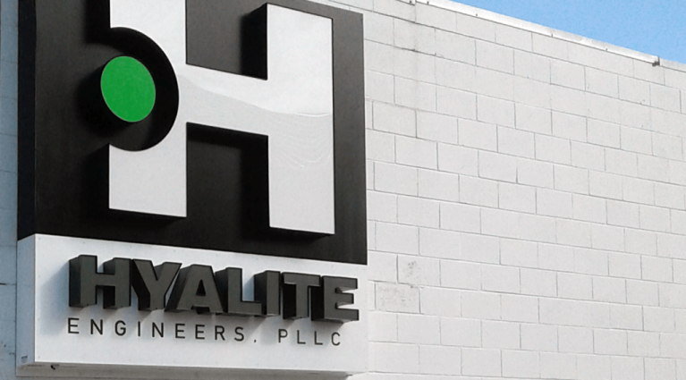 Article Image_Hyalite Engineers Wall Cabinet on white brick wall