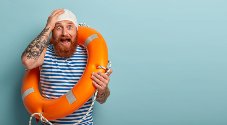 Man with life raft around neck asking for help