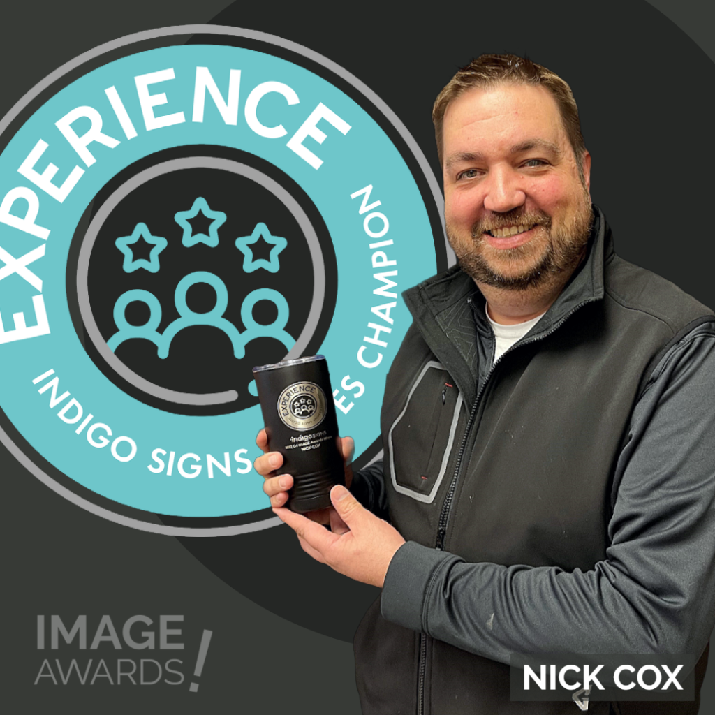 Nick Cox posing with custom mug Experience IMAGE AWARD Q4 2022